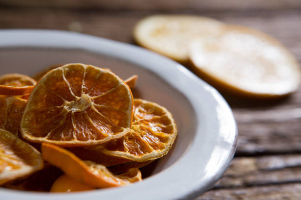 istock Dried sweet lemon on wooden table 846225684