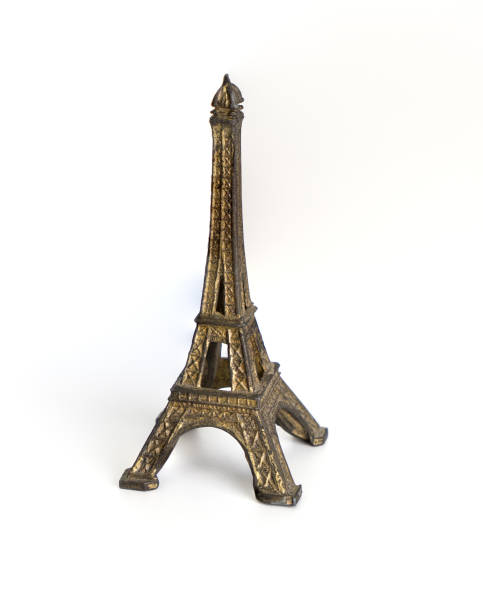 istock Eiffel tower souvenir toy isolated on white 846226330