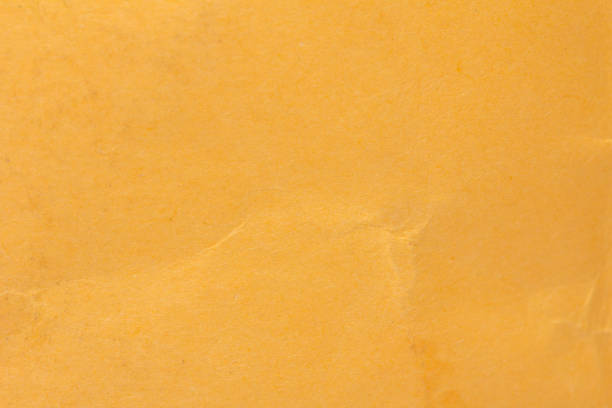 istock yellow crumpled paper as a background 846231694