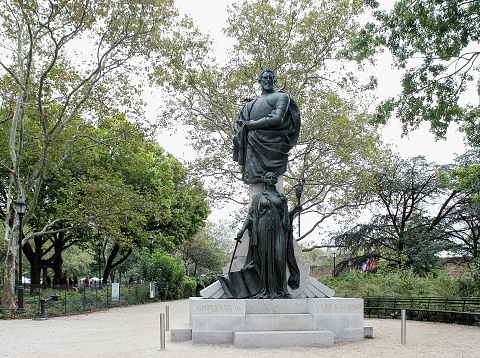 New York, USA - September 2016: A statue in Lower Manhattan of the Italian explorer Giovanni da Verrazzano by Ettore Ximenes, for whom the Verrazano-Narrows Bridge is named.