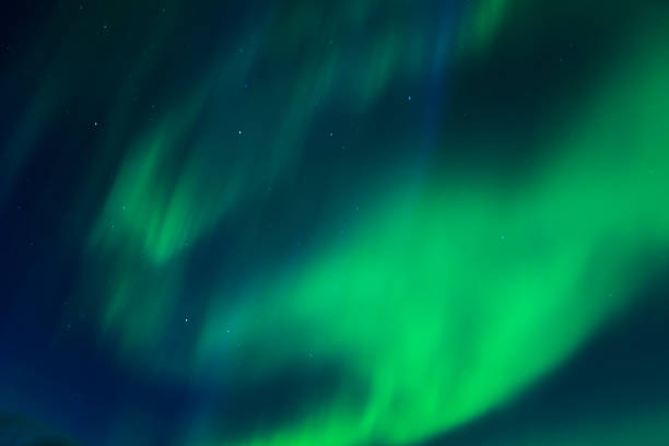 Incredibly bright Aurora borealis (Northern lights)  over the Iceland