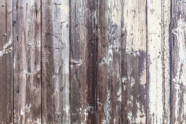istock Rustic wooden planks background with flaking white paint 846233466