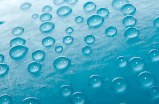 istock drops of water on a blue background. macro 846236398