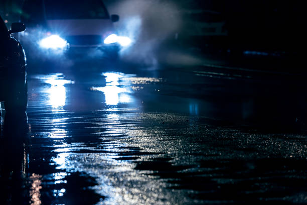 istock car traffic during rainy night with headlights switched on 846236976