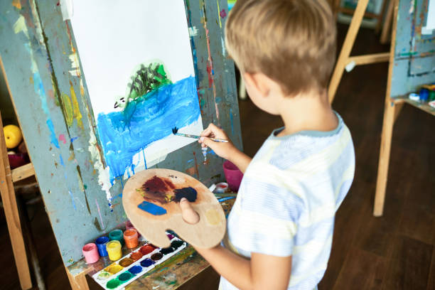 istock Cute Little Artist Focused on Work 846239362