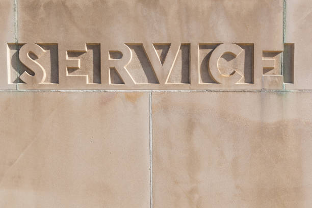 istock The word SERVICE carved in concrete with copy space 846239652