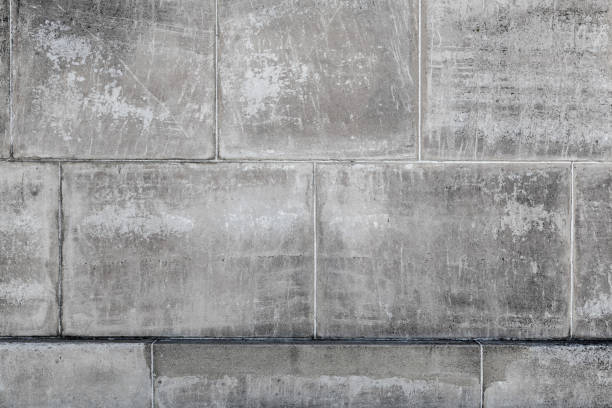 istock Grungy concrete blocks wall background texture with straight lines 846240956