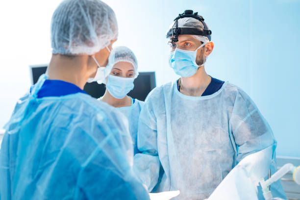 istock Attentive medical worker looking at his colleague 846252748