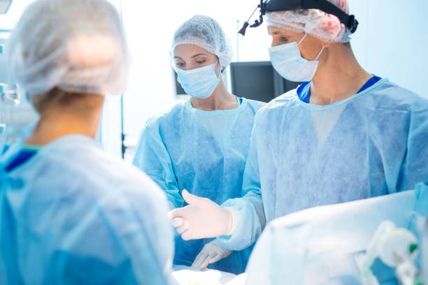 istock Attentive medical workers operating patient 846255588