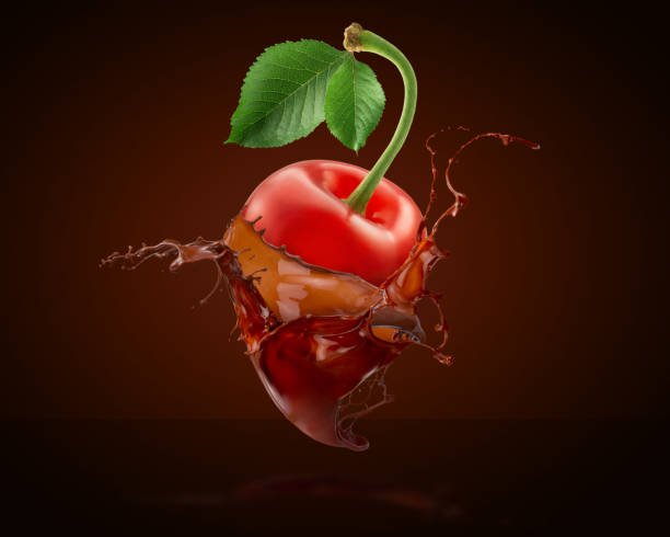 istock cherry in chocolate splash on a black background 846263704