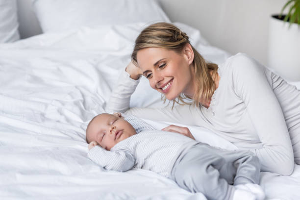istock mother with sleeping baby 846270060