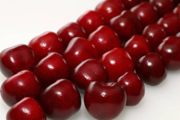 istock red delicious ripe cherries on a white background 846270226