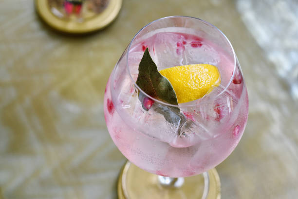 istock Cocktail drinks, Colorful pink alcohol beverage on table bar. 846271594