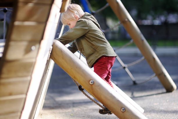 istock Happy little boy having fun on outdoor playground 846271718