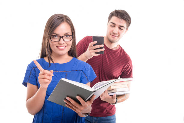 istock Boyfriend taking picture of girlfriend's notebook 846271836