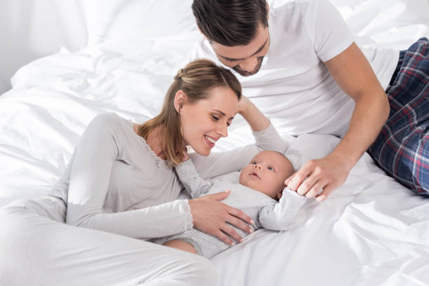istock parents with baby boy 846271970