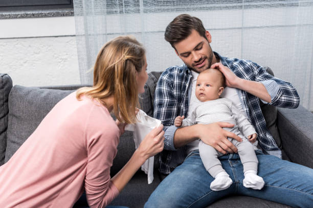 istock parents with baby boy 846274674
