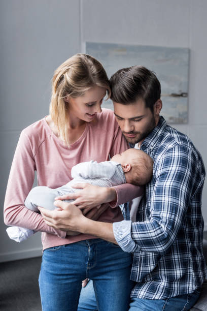 istock parents with baby boy 846274790
