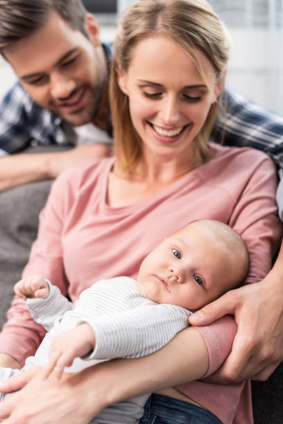 istock parents with baby boy 846275632