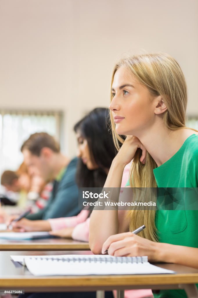 Student Writing Study Notes Young Students Writing Notes In Classroom Stock Photo - Download Image ...