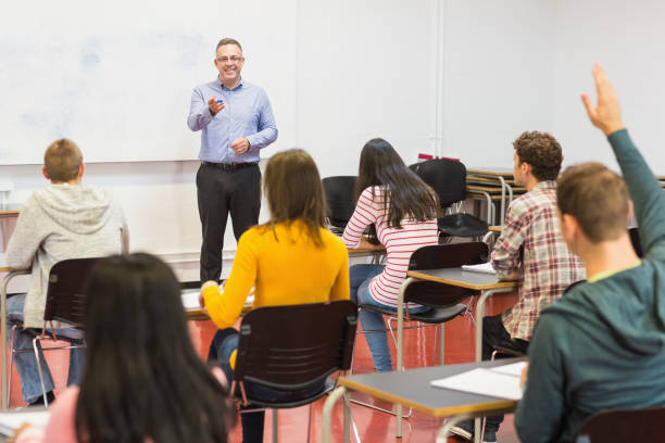 istock Attentive students and teacher in the classroom 846275852