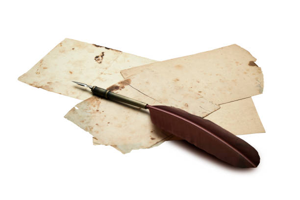 istock Still life with old papers with space for copy text and brown vintage quill on white background - photo with selective focus 846275956