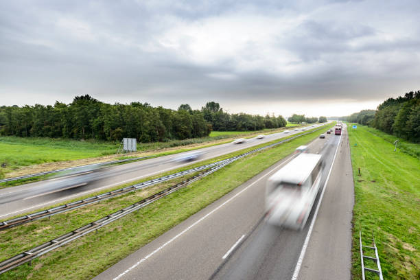istock Traffic on a highway in an open rural landscape 846279310