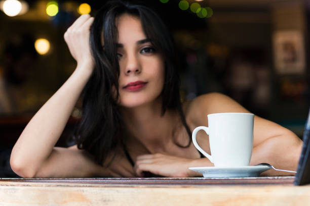 Beautiful businesswoman having a cup of coffee