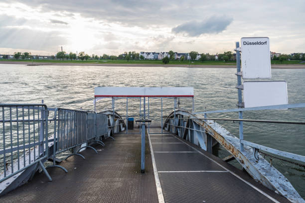 istock Pier at sunset over the river Rhine in Dusseldorf, Germany 846280474