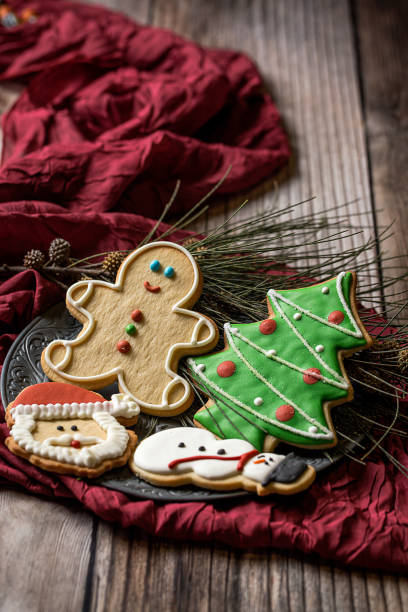 istock Christmas cookies on wooden table 846283898