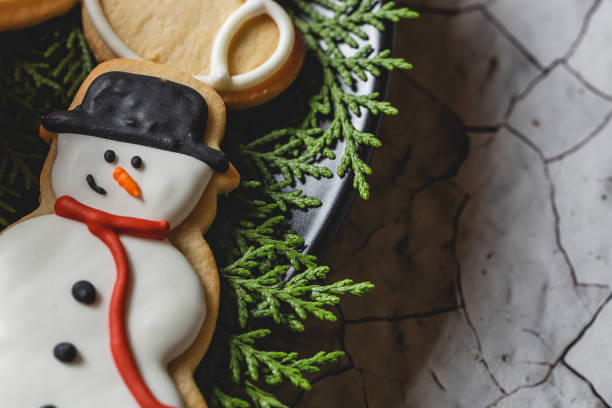 istock Christmas cookies on wooden table 846283912