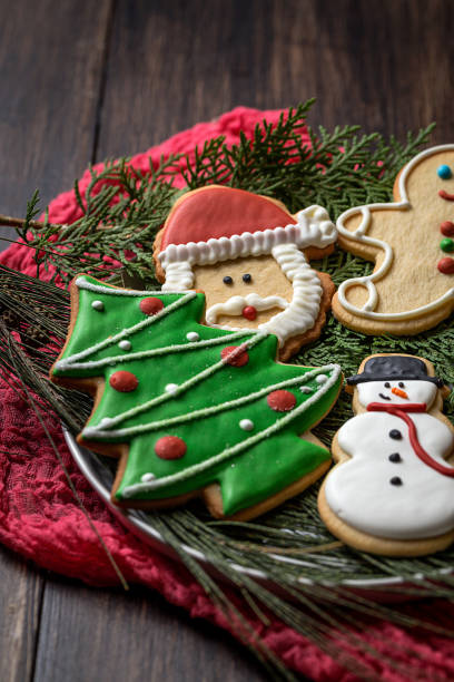 istock Christmas cookies on wooden table 846284360