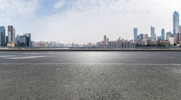 istock Panoramic skyline and buildings with empty road，chongqing city，china 846287364