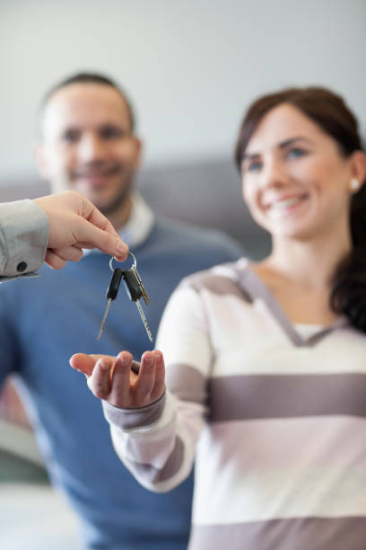 istock Couple receiving keys 846287470