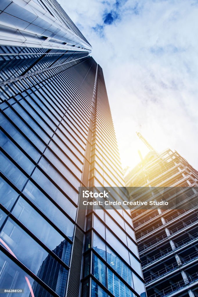 Modern glass silhouettes of skyscrapers Modern glass silhouettes of skyscrapers at day time Building Exterior Stock Photo