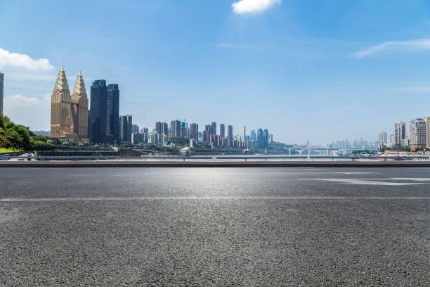 istock Panoramic skyline and buildings with empty road，chongqing city，china 846288260