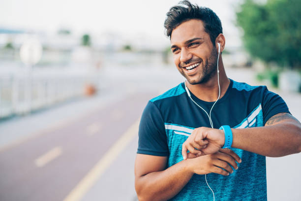 istock Happy sportsman with smart watch 846288736