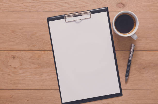 istock Mockup for checklist, note paper and coffee on wood background 846289662