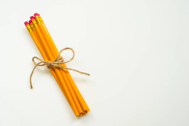 istock Group of pencils tied with rope isolated on white background 846292208