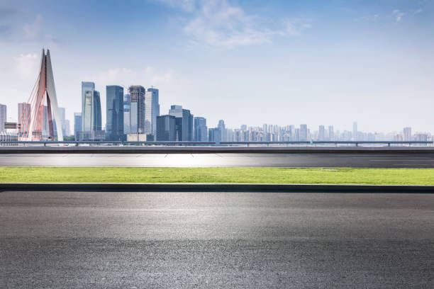 istock Panoramic skyline and buildings with empty road，chongqing city，china 846293056