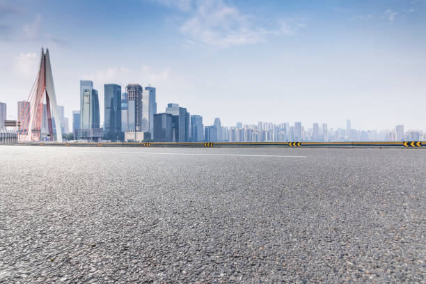 istock Panoramic skyline and buildings with empty road，chongqing city，china 846293064