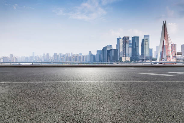 istock Panoramic skyline and buildings with empty road，chongqing city，china 846293070