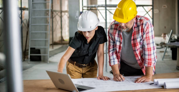 istock Male and female architect using laptop 846307082