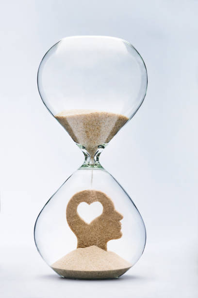 time is love. emotional intelligence - waiting hourglass people impatient imagens e fotografias de stock