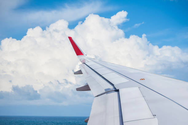 istock Big clound and seascape View from Airplane Window 846317960