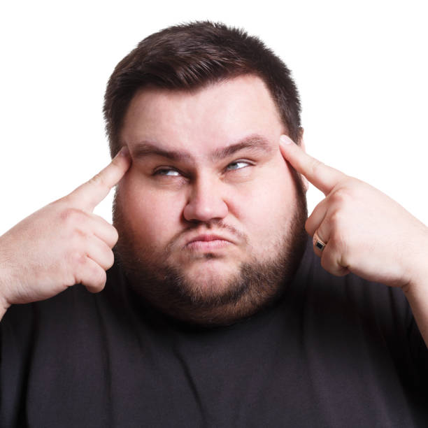 istock Man suffering from headache, isolated shot 846318622