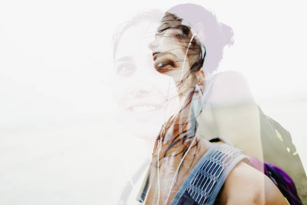 Exploration addict Double exposure photo of a young determined woman during her exploration of the world courage photos stock pictures, royalty-free photos & images