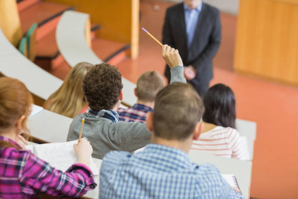 istock Students sitting at the college lecture hall 846333620