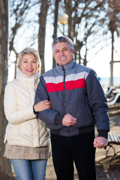 istock Mature couple walking on sunny day 846338124