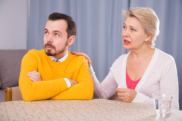 istock Mature mother and son quarrel 846343748